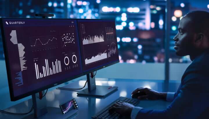 Man is sorting through finances on a computer