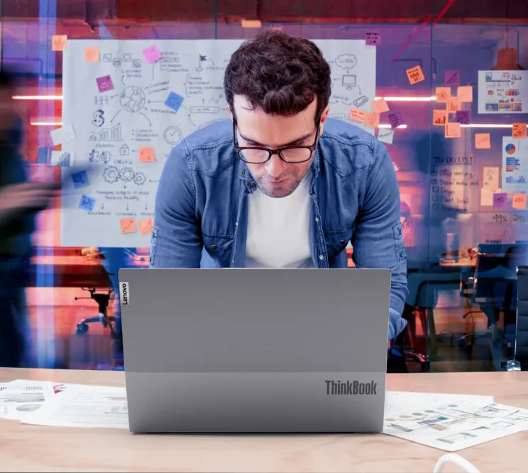 Man at ThinkBook Laptop